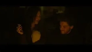 man and woman in dimly lit room — Into the Wild