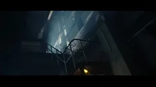 Three people on abandoned building stairway with fire — Doctor Strange 2