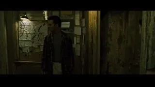 man and woman by lockers in dim room — Fight Club
