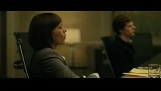 man and woman at office desk — The Social Network