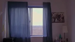 open window with cityscape view — Screened Out