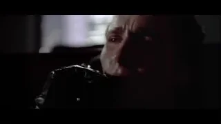 Man in office talking on phone — American Psycho