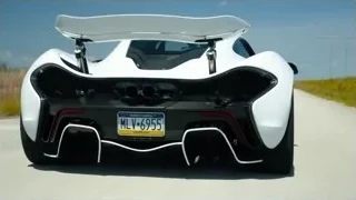 White sports car driving on road — Sports Cars