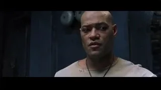 Bald man close-up in industrial setting — The Matrix