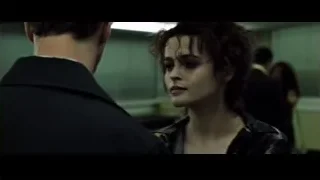 Woman with knife embracing man — Fight Club