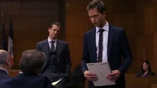 man in suit in courtroom — Suits