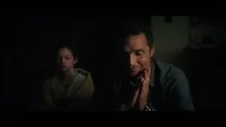 Man praying with young girl watching — Interstellar