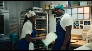 man and woman in kitchen with baked goods — The Bear