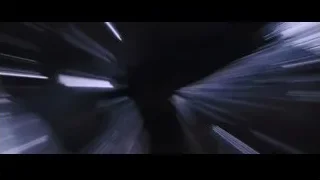 silhouetted people looking up at night sky — Iron Man