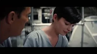 man and woman in laboratory scrubs — Interstellar