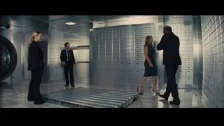 Business people in bank vault with lockers — Now You See Me