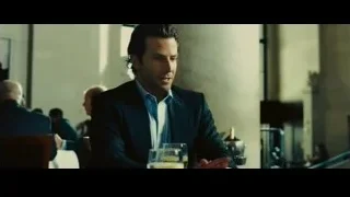 man sitting at table in restaurant — Limitless