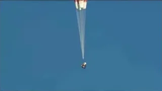 parachute flying with smoke trail — Elon Musk: Return to Space