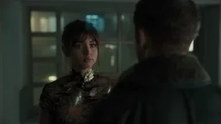 woman in Chinese dress looking at man — Blade Runner 2049