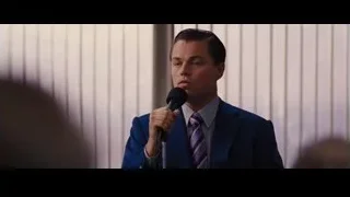 man sitting at dimly lit bar — The Wolf Of Wall Street