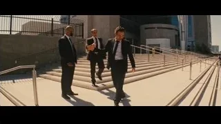 three men in suits walking up stairs — Now You See Me