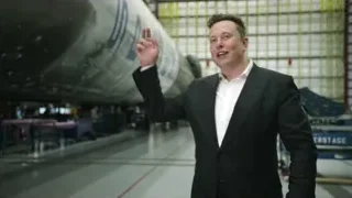 Elon Musk in hangar with rocket engine — Elon Musk: Return to Space