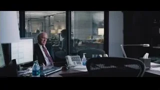 Two men in office with window blinds — The Big Short