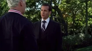 Two men talking in garden — Suits