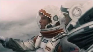 Two astronauts in space suits — Interstellar