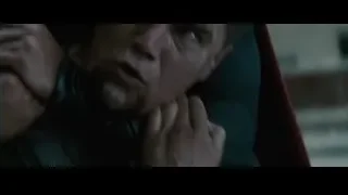 man with intense expression holding object — Superman: Man of Steel