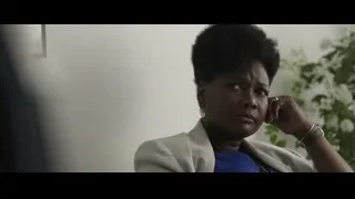 African-American woman deep in thought — F1