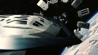 Futuristic spaceship flying over Earth — Interstellar