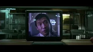 man's face on television screen — Batman: The Dark Knight