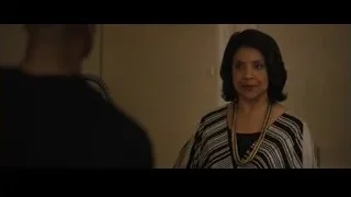 Woman with serious expression in room — Creed 2
