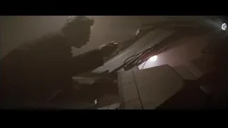 man smoking cigarette in dark room — Batman
