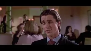 Man in suit standing in formal room — American Psycho