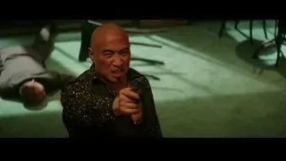 bald man holding gun over person on floor — Bruce Lee: Birth of The Dragon