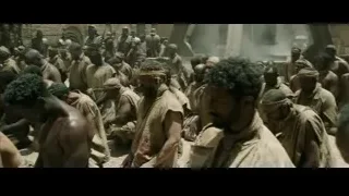 men in traditional clothes in desert ruins — Gladiator 2