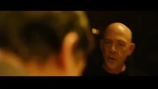 bald man speaking with wide eyes — Whiplash