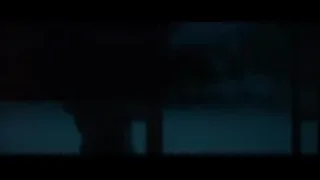 person in hooded jacket in dark room — Superman: Man of Steel