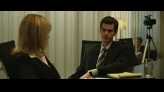 man and woman at office desk — The Social Network