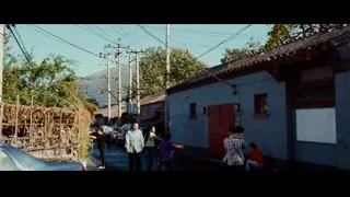 street scene with houses and large dome building — The Karate Kid