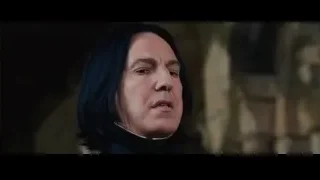 Man in dark coat speaking — Harry Potter and the Philosophers Stone