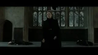 Woman with wand over dead bodies — Harry Potter and the Deathly Hallows 2
