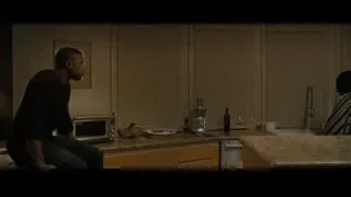 Man and woman in kitchen, man in thought — Creed 2
