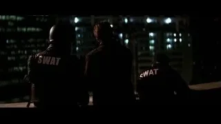 SWAT officers on rooftop at night — Batman: The Dark Knight