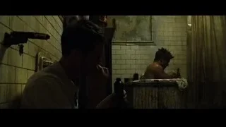 man looking in bathroom mirror — Fight Club