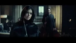 Woman in fur coat in hotel lobby — John Wick