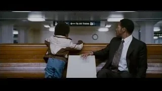man and boy on bench in subway station — The Persuit of Happyness