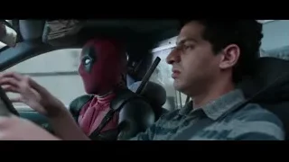 Deadpool in car looking out window — Deadpool