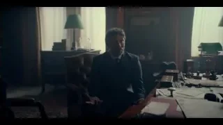 Man deep in thought in dimly lit office — Peaky Blinders