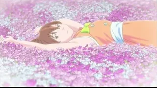 young woman lying in field of flowers — I Want To Eat Your Pancreas