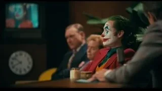 Joker in red suit in courtroom — Joker