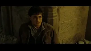 Harry Potter sitting in old stone room — Harry Potter and the Deathly Hallows 2