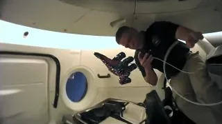 man in airplane holding toy gun — Elon Musk: Return to Space
